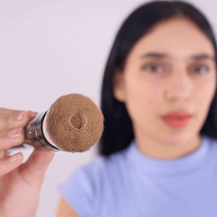 Powder head blending on the cheek