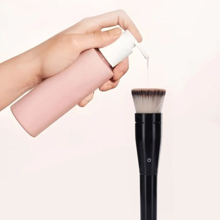 Pea-sized dot of foundation on the brush head